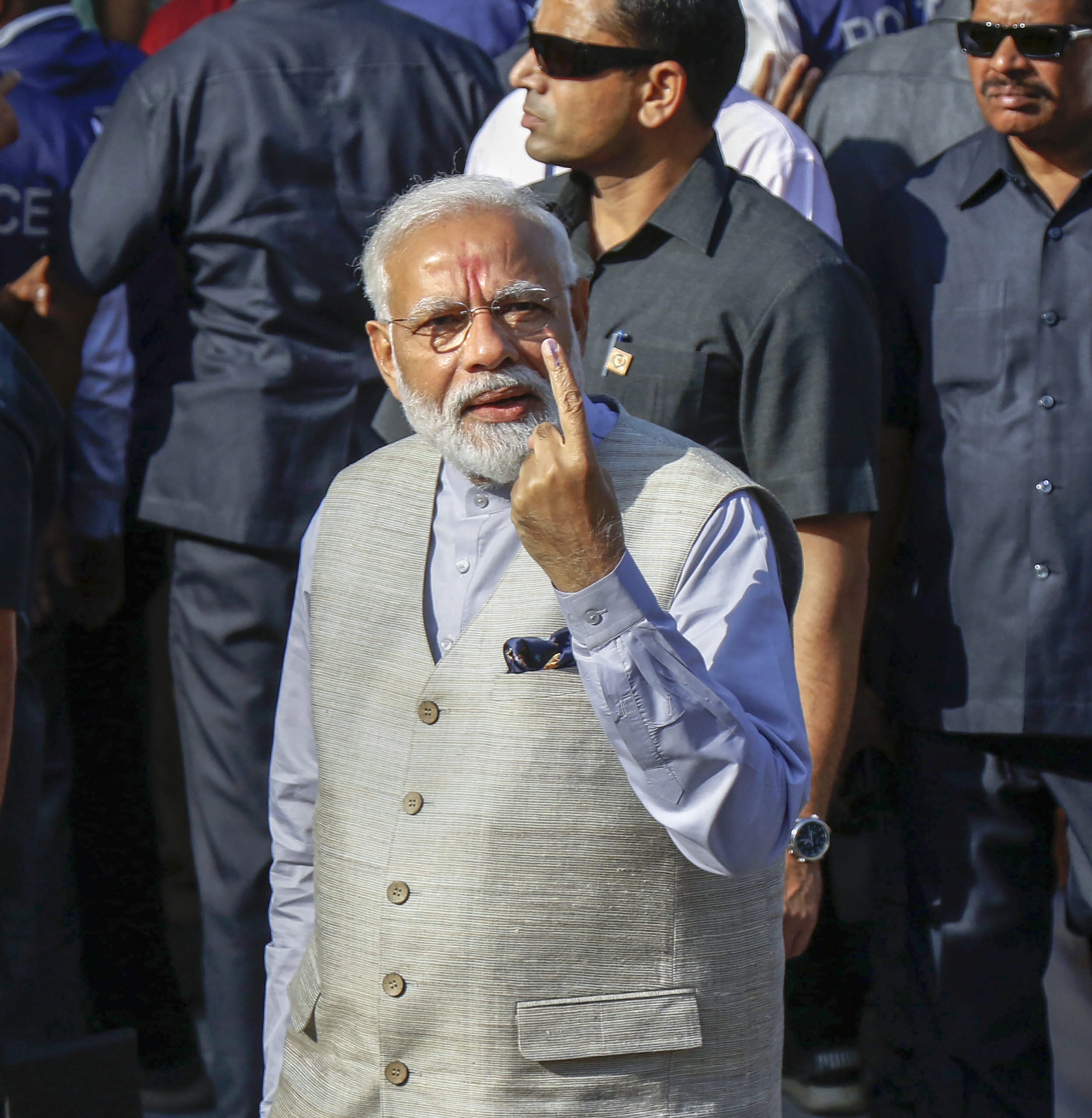 PM Modi Casts Vote In Gujarat Says Voter ID More Powerful Than IED GG2